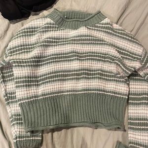 Green and white sweater